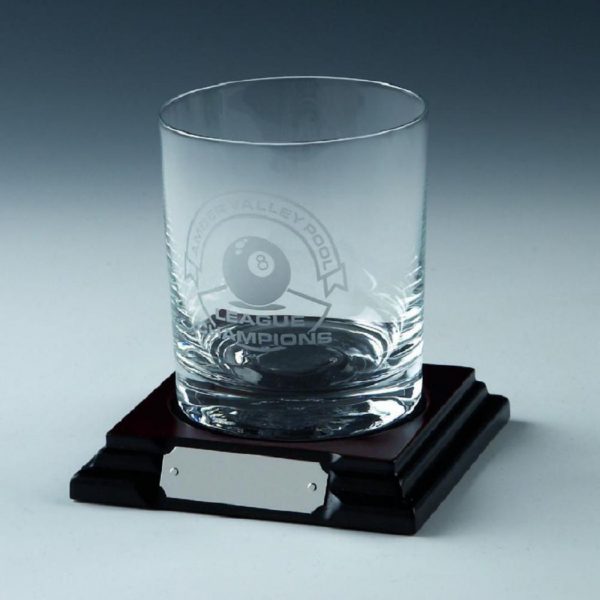 Single spirit glass on wood base