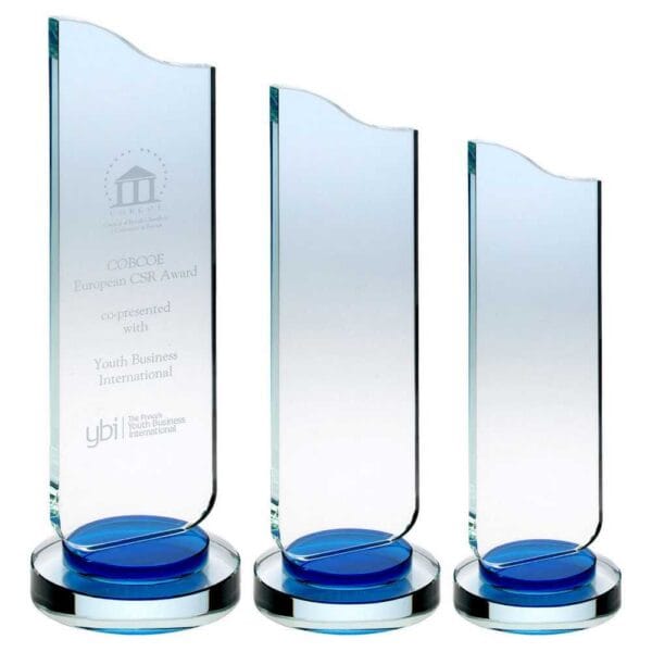 CLEAR GLASS PLAQUE WITH BLUE COLLAR ON ROUND BASE